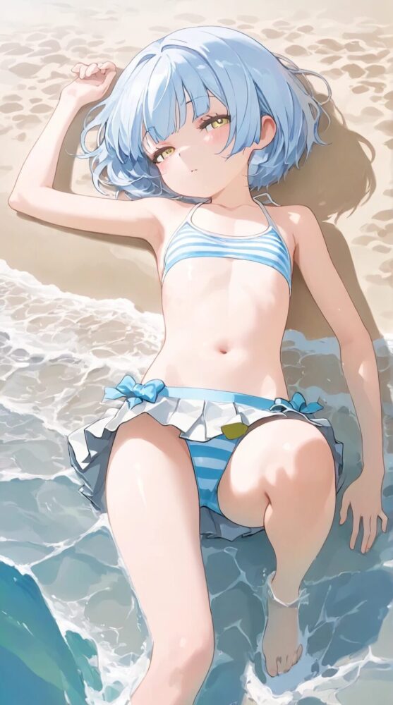 ビーチに寝そべるビキニ幼女